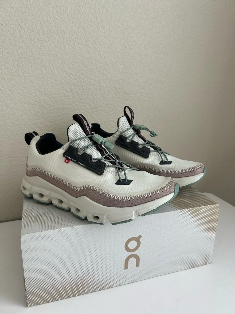 On Running women’s cloudaway Lace-Up Sneakers in White and Light Pink